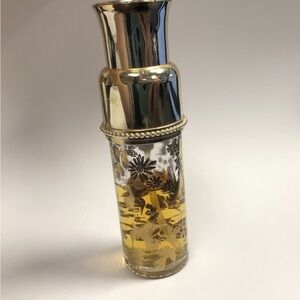 Nina Ricci Gold and Silver “L’ Air du Temps” Floral Perfume Bottle